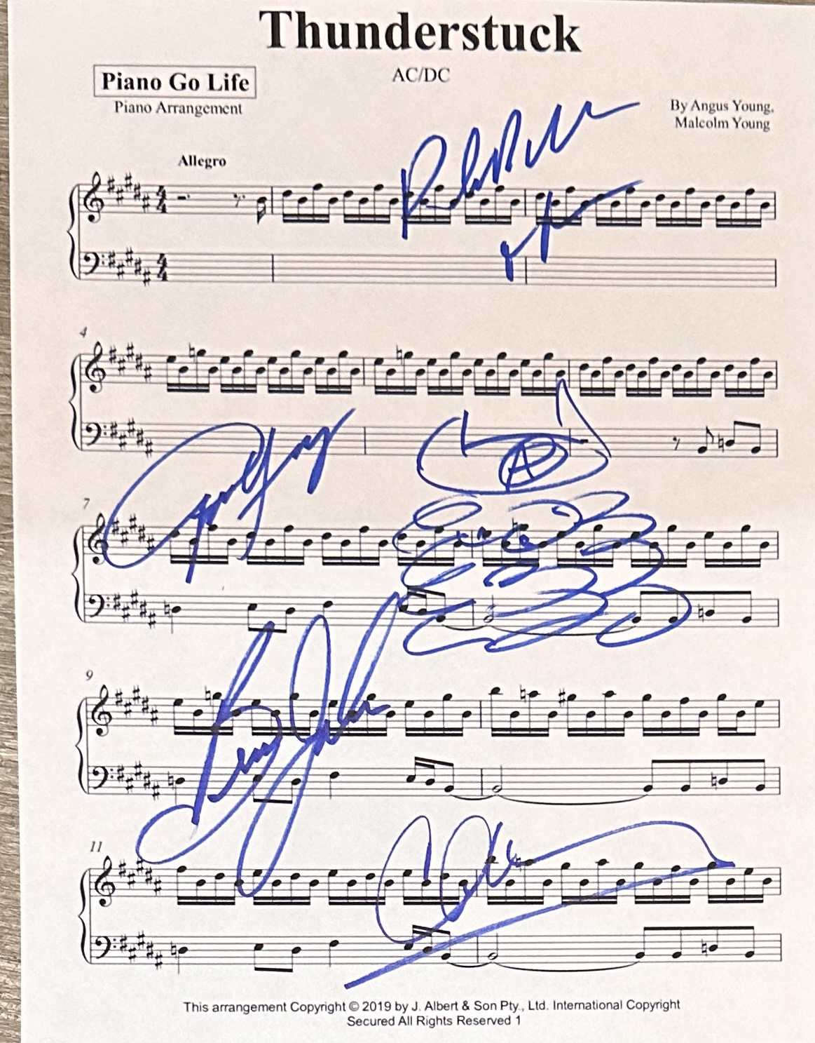 AC/DC Autographed Sheet Music Angus Brian Phil Cliff